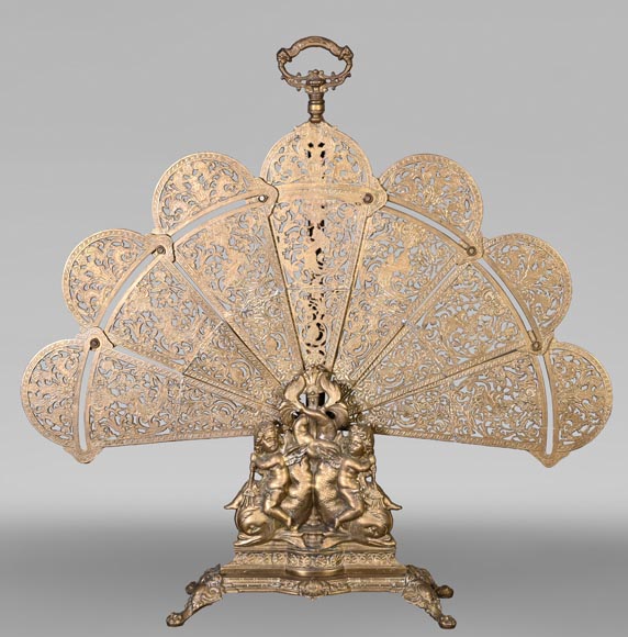 Large Napoleon III style fan-shaped fire screen with dolphin and putti decoration Large Napoleon III style fan-shaped fire screen with dolphin and putti decoration-0