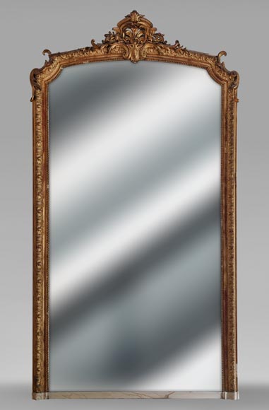 Large Regence style gilded trumeau topped by a shell Large Regence style gilded trumeau topped by a shell-0