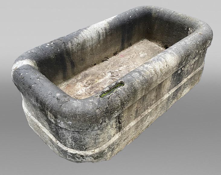 A large antique carved stone watering trough A large antique carved stone watering trough-0