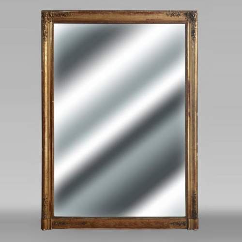 Louis Philippe period gilded trumeau decorated with flowers.