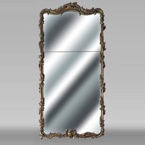 Louis XV period trumeau with olive garland, in carved wood