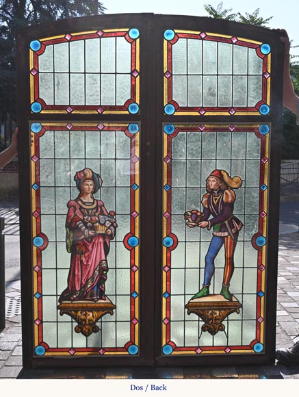 Double stained glass window in neo-Renaissance style depicting two figures with offerings Double stained glass window in neo-Renaissance style depicting two figures with offerings-8