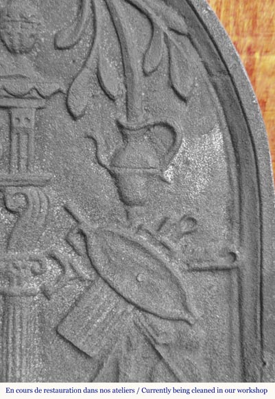 Cast iron fireback in a semicircle, dated 1623 Cast iron fireback in a semicircle, dated 1623-4