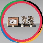 Alabaster clock with cyclists in regule