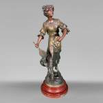 Louis MOREAU after, “Tennis player”, statuette in regula, two-tone patina