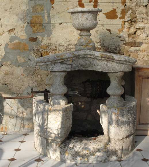 Antique stone well from the 18th century-0
