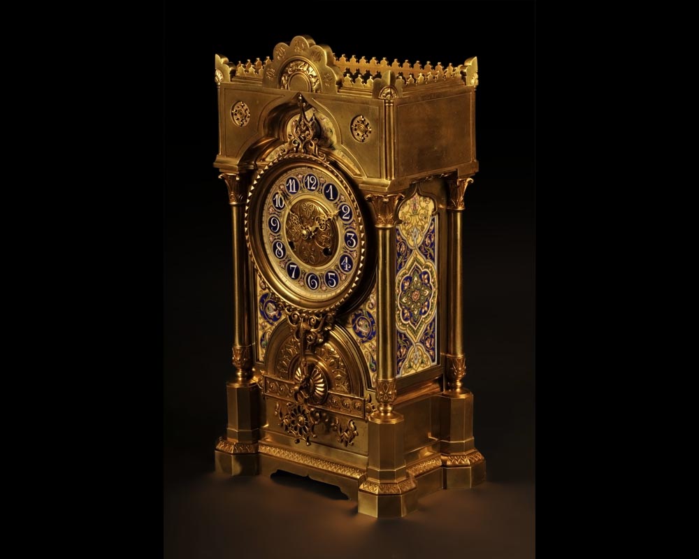 Mantle garniture in the orientalist taste  in gilt-bronze with  polychrome porcelain decoration   Mantle garniture in the orientalist taste  in gilt-bronze with  polychrome porcelain decoration  -1