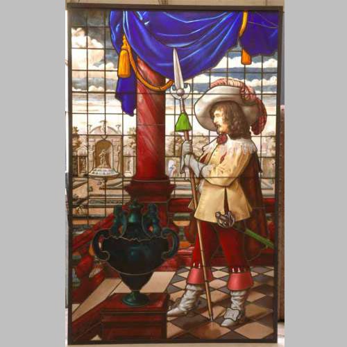 Antique stained glass window signed