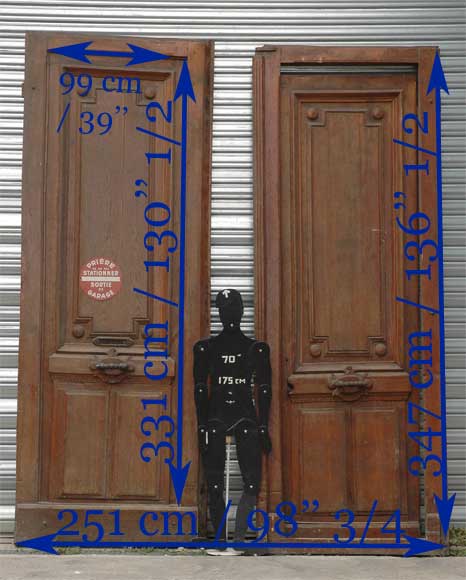 A pair of wooden monumental doors.  A pair of wooden monumental doors. -9