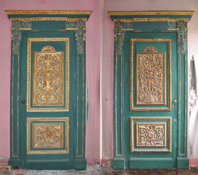 Pair of green doors with a gilded wooden decoration-0