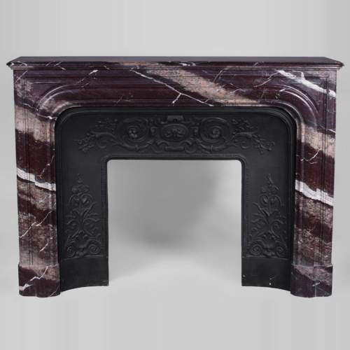 Antique Louis XIV style fireplace in Campan Rubane marble