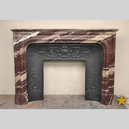 Antique Louis XIV style fireplace in Campan Rubane marble