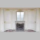 Beautiful Louis XV style paneled room with 18th century stone fireplace