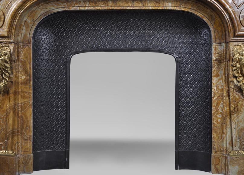 Extraordinary antique Louis XIV style fireplace with lions heads in Alabastro di Busca and gilded bronze