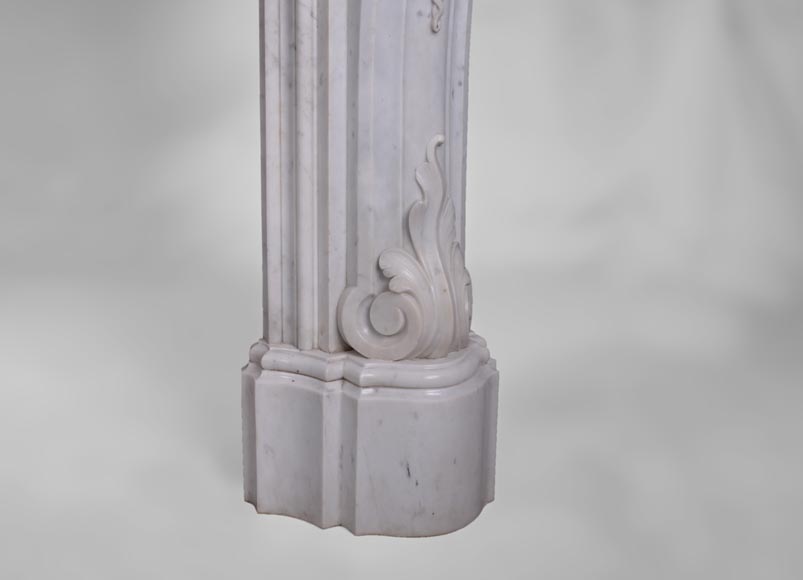Beautiful antique Louis XV style fireplace with opulent decor in white Carrara marble Beautiful antique Louis XV style fireplace with opulent decor in white Carrara marble-11
