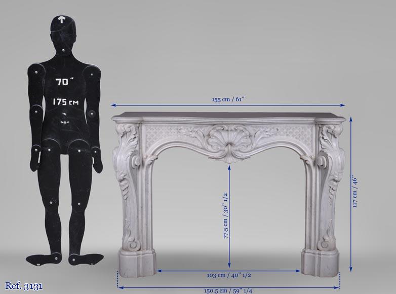 Beautiful antique Louis XV style fireplace with opulent decor in white Carrara marble Beautiful antique Louis XV style fireplace with opulent decor in white Carrara marble-13