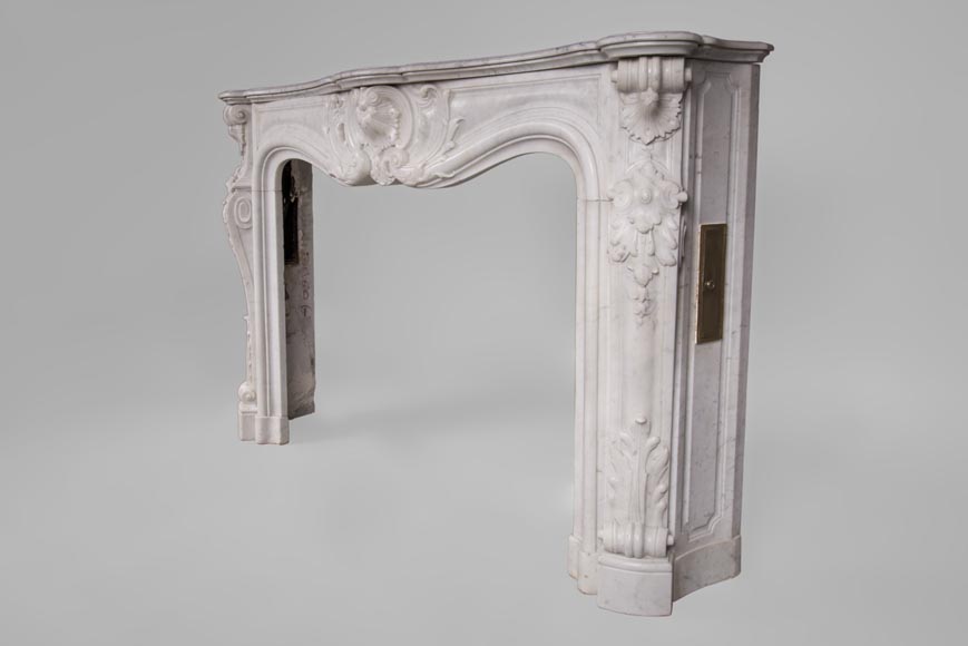 Beautiful antique Louis XV style fireplace with rich decor in white Carrara marble Beautiful antique Louis XV style fireplace with rich decor in white Carrara marble-7