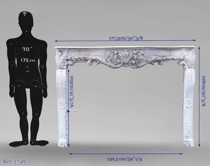 A beautiful antique richly sculpted fireplace from Louis XV period made out of painted oak A beautiful antique richly sculpted fireplace from Louis XV period made out of painted oak-11