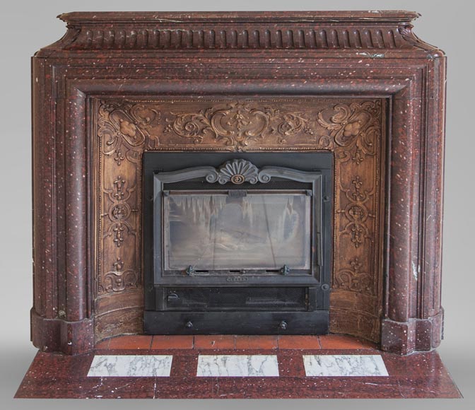 An antique Louis XIV style fireplace, with acroterion and Bollection, made out of Rouge Griotte marble An antique Louis XIV style fireplace, with acroterion and Bollection, made out of Rouge Griotte marble-0