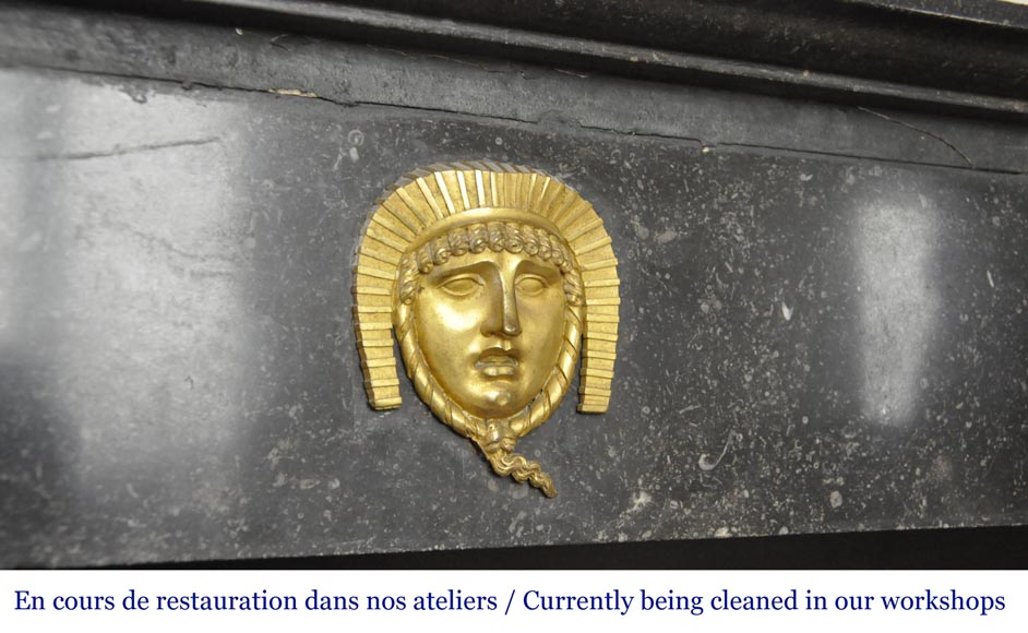 An antique Empire fireplace made out of black marble, witrh bronze ornaments and detached columns An antique Empire fireplace made out of black marble, witrh bronze ornaments and detached columns-2