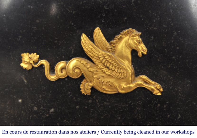 An antique Empire fireplace made out of black marble, witrh bronze ornaments and detached columns An antique Empire fireplace made out of black marble, witrh bronze ornaments and detached columns-3