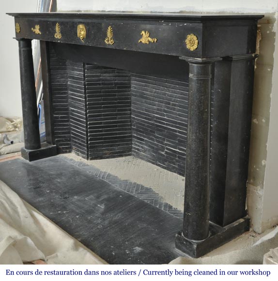 An antique Empire fireplace made out of black marble, witrh bronze ornaments and detached columns An antique Empire fireplace made out of black marble, witrh bronze ornaments and detached columns-7