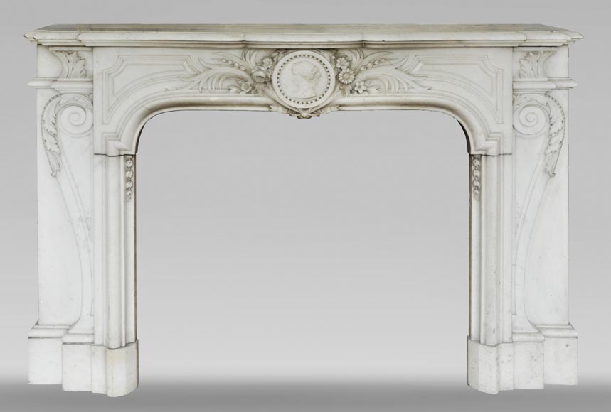 Antique Napoleon III fireplace with a woman's profile decoration in a medallion Antique Napoleon III fireplace with a woman's profile decoration in a medallion-0