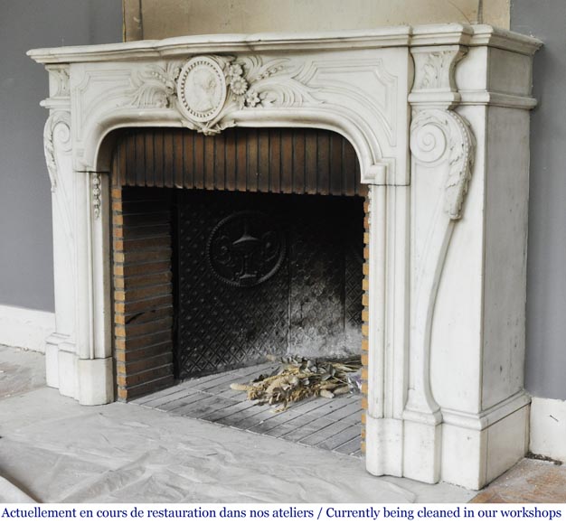 Antique Napoleon III fireplace with a woman's profile decoration in a medallion Antique Napoleon III fireplace with a woman's profile decoration in a medallion-10