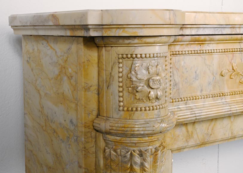 Large Louis XVI style mantel in yellow Sienna marble with entablature adorned with the head of Apollo and arrow heads on the jambs Large Louis XVI style mantel in yellow Sienna marble with entablature adorned with the head of Apollo and arrow heads on the jambs-7