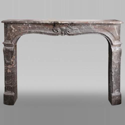 Important Louis XV period fireplace in Rouge du Nord marble