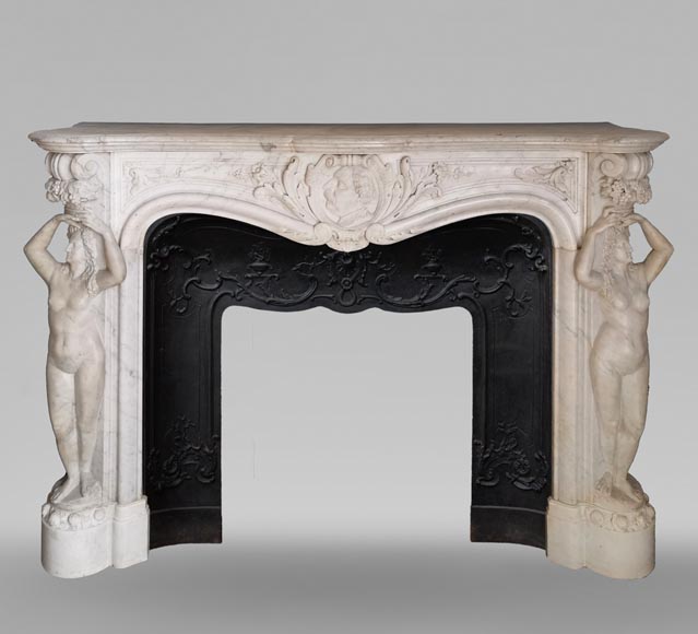 Rich and original Napoleon III fireplace in Carrara marble with caryatids and a man's profile Rich and original Napoleon III fireplace in Carrara marble with caryatids and a man's profile-0