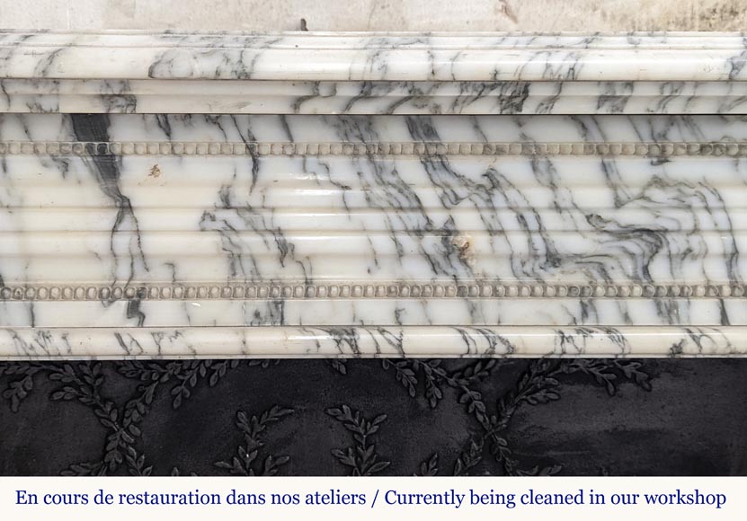 Louis XVI style fireplace with peals edges in veined Carrara marble Louis XVI style fireplace with peals edges in veined Carrara marble-1