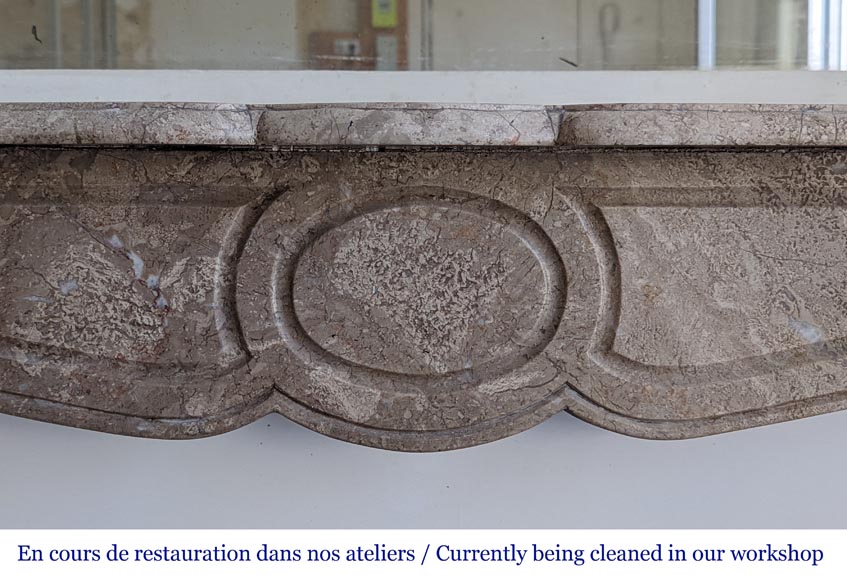 An antique Louis XV style fireplace, Pompadour model, in Lunel marble An antique Louis XV style fireplace, Pompadour model, in Lunel marble-1