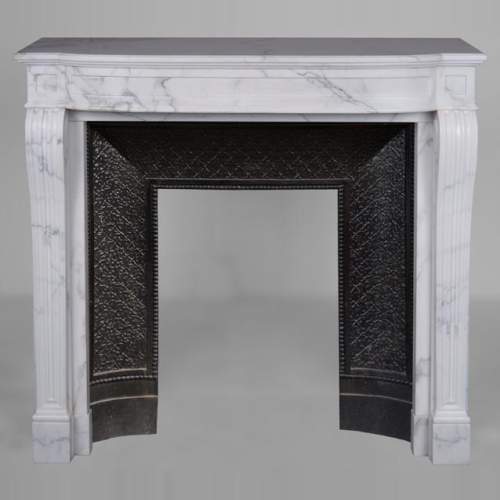 Louis XVI style mantel in semi-statuary marble with curved entablature
