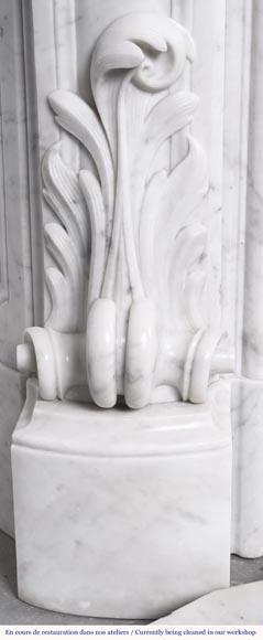 A highly sculpted Louis XV style fireplace in Carrara marble, decorated with a shell motif. A highly sculpted Louis XV style fireplace in Carrara marble, decorated with a shell motif.-9