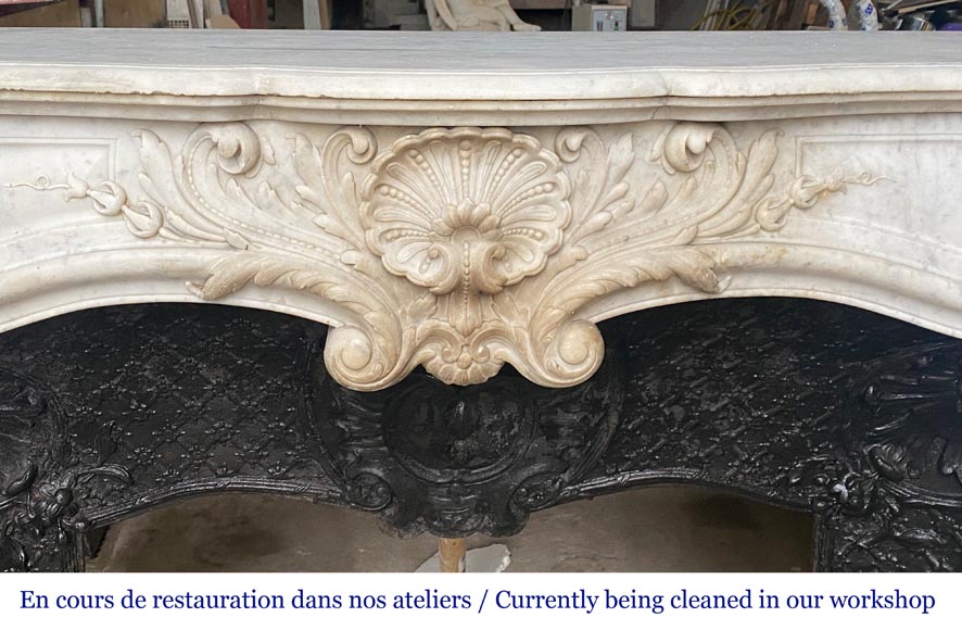 Louis XV style mantel with shell framed by palmettes carved in Carrara marble Louis XV style mantel with shell framed by palmettes carved in Carrara marble-1