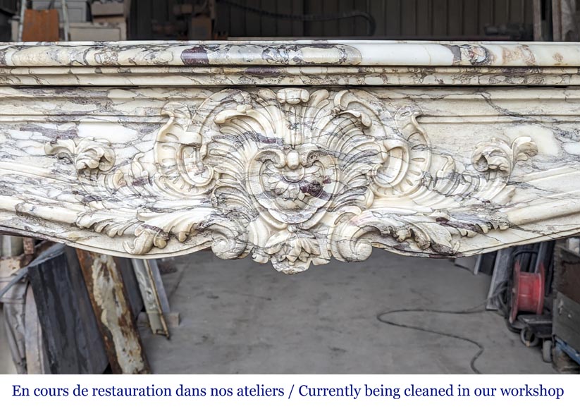 Large Regency-style mantel richly carved in violet breche marble Large Regency-style mantel richly carved in violet breche marble-1