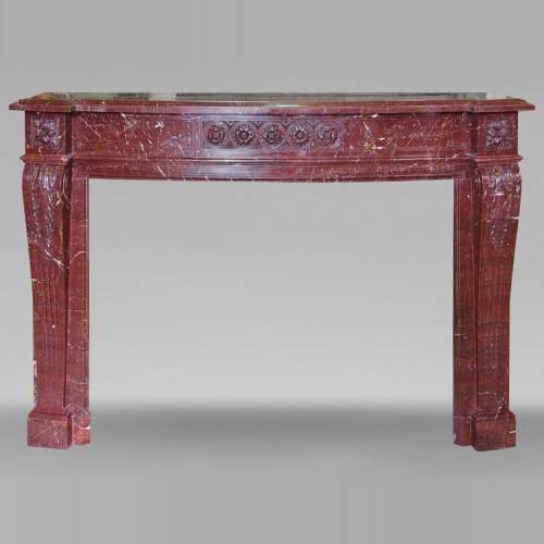 Louis XVI style mantel with rosette carved in red marble