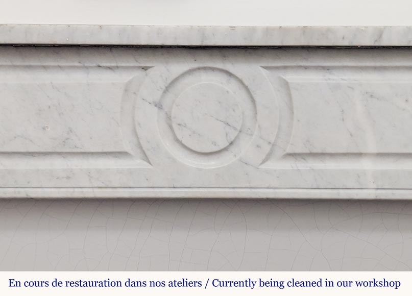 Carved Carrara marble Louis XVI mantel with canted corners Carved Carrara marble Louis XVI mantel with canted corners-1