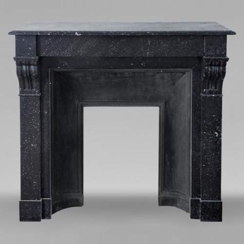 Napoleon III style mantel in black speckled marble with modillions