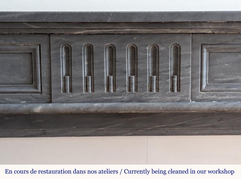 Louis XVI style mantel with curved flutes adorned with rosettes carved in Turquin marble Louis XVI style mantel with curved flutes adorned with rosettes carved in Turquin marble-1