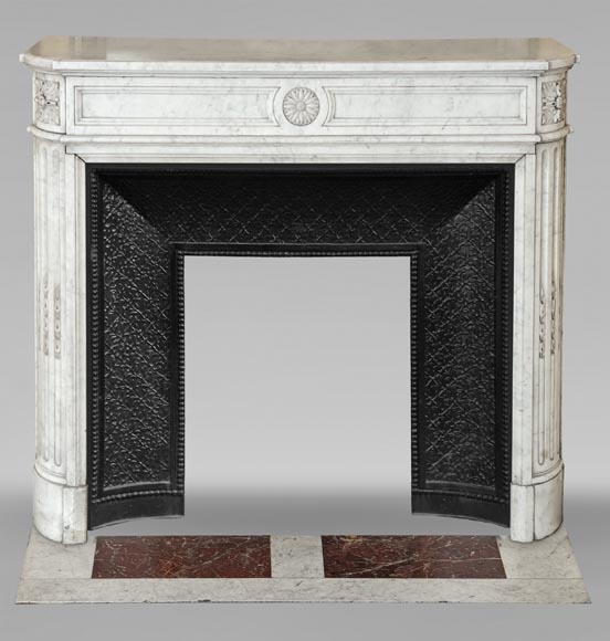 Louis XVI style Carrara marble mantel with rounded corners adorned with a sunflower flower Louis XVI style Carrara marble mantel with rounded corners adorned with a sunflower flower-0