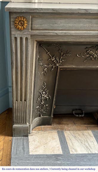 Louis XVI style mantel in light blue Turquin marble decorated with bronze sunflowers Louis XVI style mantel in light blue Turquin marble decorated with bronze sunflowers-3