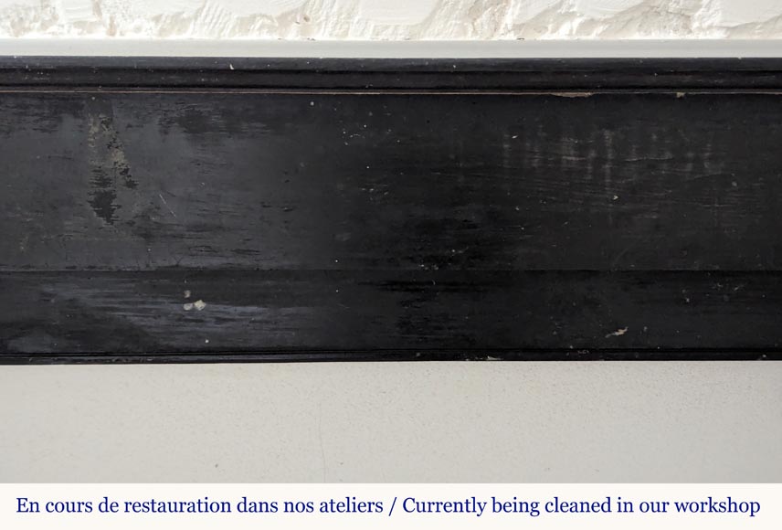 Napoleon III style mantel with black marble modillions Napoleon III style mantel with black marble modillions-1