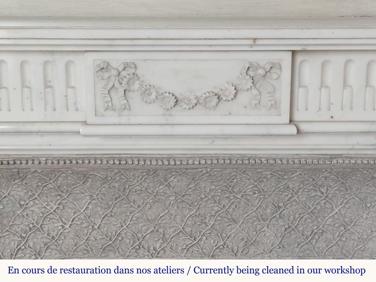 Louis XVI style semi-statuary marble mantel adorned with a frieze of flowers Louis XVI style semi-statuary marble mantel adorned with a frieze of flowers-1