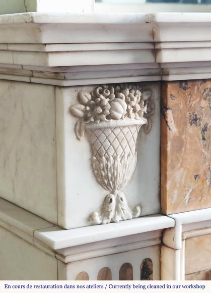 Louis XVI style two-tone fireplace in Carrara white and Sienna yellow, decorated with flower vases Louis XVI style two-tone fireplace in Carrara white and Sienna yellow, decorated with flower vases-3