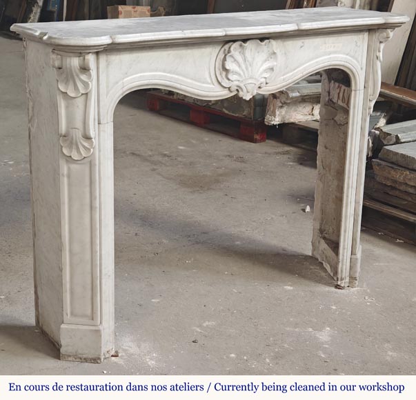 Louis XV style fireplace in Carrara marble decorated with a shell Louis XV style fireplace in Carrara marble decorated with a shell-2