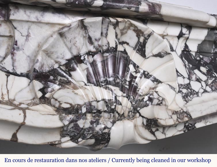 Louis XV style fireplace in purple breccia, decorated with a shell Louis XV style fireplace in purple breccia, decorated with a shell-2