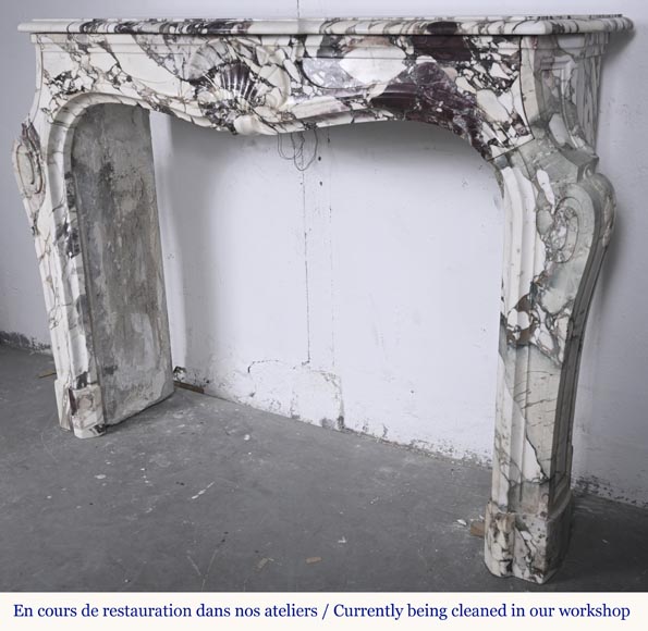 Louis XV style fireplace in purple breccia, decorated with a shell Louis XV style fireplace in purple breccia, decorated with a shell-8