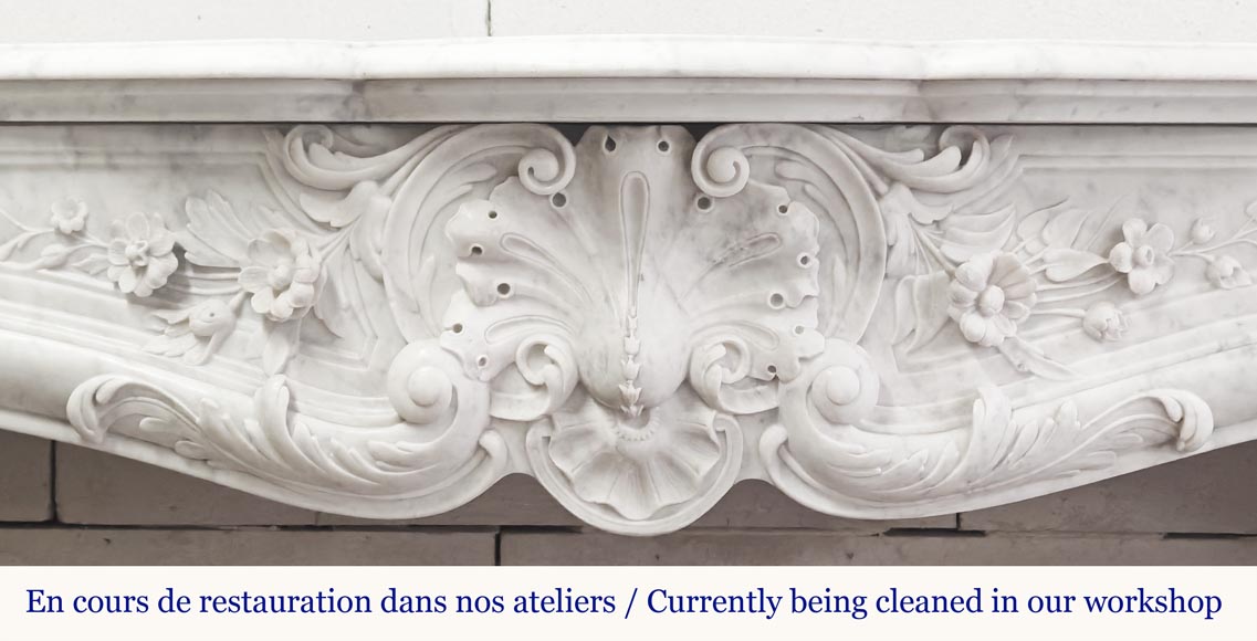 Louis XV style fireplace in Carrara marble, decorated with a floral shell Louis XV style fireplace in Carrara marble, decorated with a floral shell-1